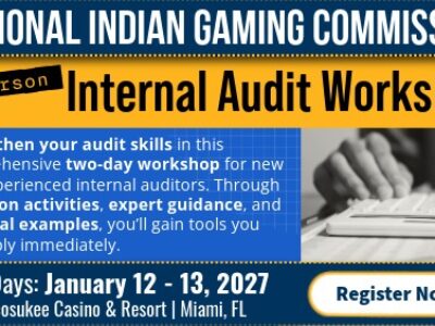 A promotional graphic for the National Indian Gaming Commission’s In-Person Internal Audit Workshop. The top section has a dark blue banner with white text that reads “National Indian Gaming Commission.” Below, against a gold background, black text announces “Internal Audit Workshop,” with a black‑and‑yellow label that says “In‑Person.” The left side contains blue text on a white and blue background describing the workshop: “Strengthen your audit skills in this comprehensive two‑day workshop for new and experienced internal auditors. Through hands‑on activities, expert guidance, and practical examples, you’ll gain tools you can apply immediately.” The graphic lists the dates “January 12–13, 2027” and the location “Miccosukee Casino & Resort | Miami, FL.” On the right side is a grayscale photo of a hand using a calculator. A dark blue banner at the bottom includes a white button with the text “Register Now!” and a small yellow arrow icon.